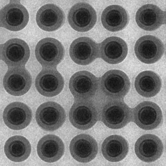In-situ TEM snapshot of water condensed around a-Si nanopillars